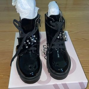 Brand new patent leather boots